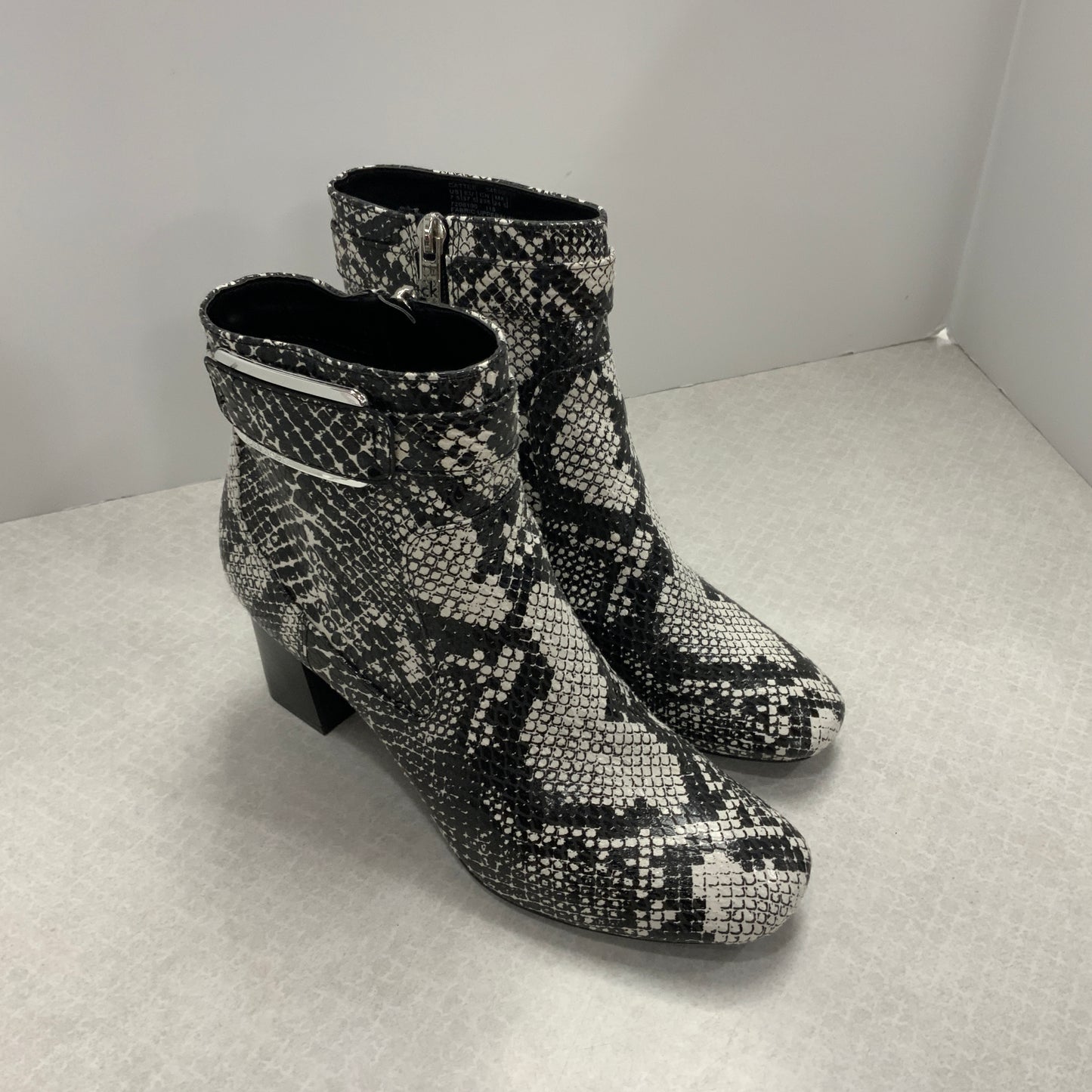 Boots Ankle Heels By Calvin Klein In Black, Size: 7.5